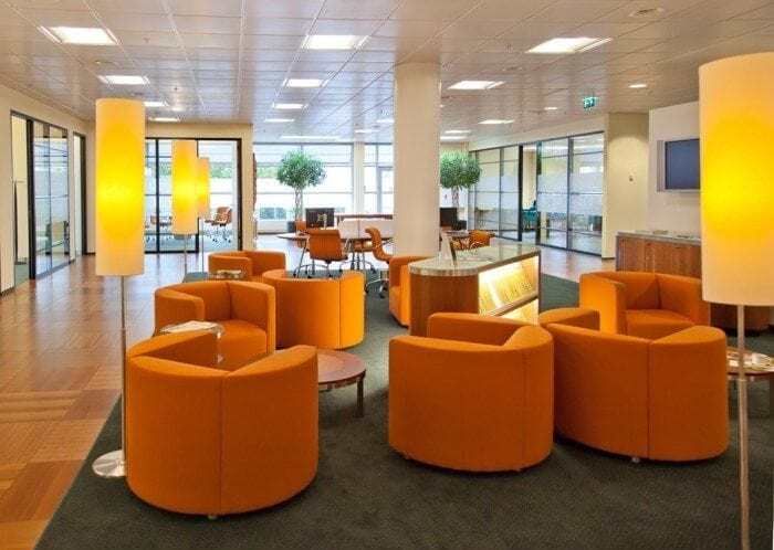 Bank lobby with modern style chairs, lamps and conference tables Bank lobby with modern style chairs, lamps and conference tables