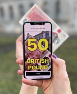 Image of a Color ID Free screenshot showing a pair of Beats by Dre headphones Individual using the Cash Reader app by using their smart phone camera to capture the bill. In big yellow letters, the app states that the image is a "50 British Pound."