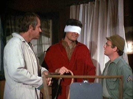 Hawkeye with bandages over his eyes during M*A*S*H Season 5 - Episode 99 Hawkeye with bandages over his eyes during M*A*S*H Season 5 - Episode 99