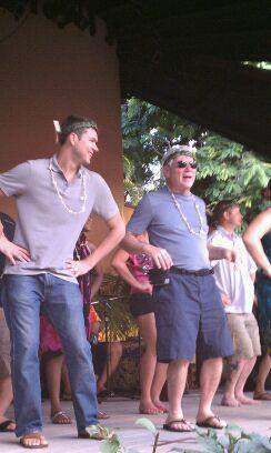 Lou Fioritto dancing on stage with people while vacationing in Hawaii