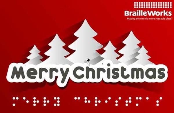 Merry Christmas displayed in print and Braille with white Christmas trees in the background. Merry Christmas displayed in print and Braille with white Christmas trees in the background.