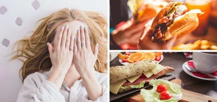 A woman covering her face with her hands, a delicious looking burger, and a cold-cuts sandwich with other appetizers on a table. A woman covering her face with her hands, a delicious looking burger, and a cold-cuts sandwich with other appetizers on a table.