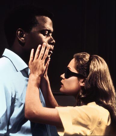 Selina touching her boyfriends face during a scene from A Patch of Blue Selina touching her boyfriends face during a scene from A Patch of Blue