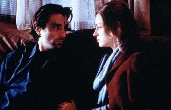 Helena Robertson (played by Uma Thurman) sitting on a couch and talking with John Berlini in Jennifer 8 Helena Robertson (played by Uma Thurman) sitting on a couch and talking with John Berlin in Jennifer 8