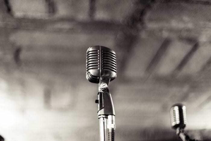 Black and white photo of two microphones Black and white photo of two microphones